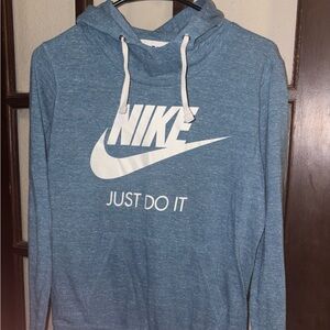 Nike White Swoosh Logo on Blue Tag